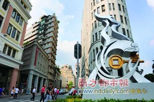 广州长堤民间金融街正式开业 市长演示打算盘
